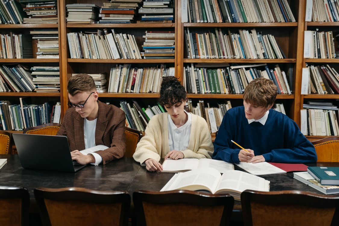 Students studying together in a library